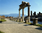Part of the colonnade at the north east end of the forum, with the Temple of Jupiter on the extreme right, Pompeii, Italy
