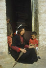 Bedouin woman spinning with her child, Bani Hamida, Jordan