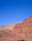 Urn tomb, centre, and Corinthian tomb, left, carved in west face of Al-Khubtha mountain, Petra, Jordan