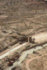 Arched gate between paved street and Temenos of Qasr al-Bint, aerial photograph, Petra, Jordan