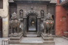 Animal figures guarding entrace to shrine, Durbar Square, Patan, Nepal