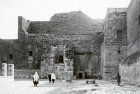 Church of the Nativity, showing successive stages by which entrance door was made smaller, circa 1910, old postcard, Bethlehem, Palestine