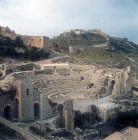 Greco-Roman theatre, walls of castle above, Soluto, Spain