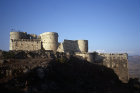 Krak des Chevaliers, crusader castle built by the Hospitaller order of St John of Jerusalem, 1142-1170, view of castle from south west, Syria