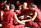 Tibetan monks in the debating courtyard of a monastery, Tibet
