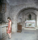 Lighting candles, St Mary