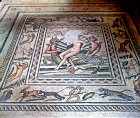 Aphrodite in a shell, flanked by two Ikhthyokentauroi, fish-tailed centaurs, named Aphros and Bythos with Eros and Himeros above,  mosaic by Zosimos of Samosata, third century, Gaziantep, Zeugma mosaic museum, Turkey