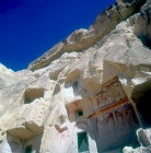 Facade fallen away exposing interior wall paintings in 963-969 AD rock-cut church, Cavusin, Cappadocia, Turkey