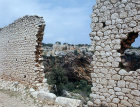 Basilica, fifth century, seen through hexagonal built wall, Kanytelis, ancient city near Elaiussa Sebaste on south east coast of Turkey