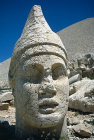 Apollo, sculpted head in stone, circa 50 BC, west side of Nemrud Dag tomb sanctuary, south eastern Turkey