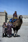 Uzbekistan, Xoraxm province, Khiva, women with camel