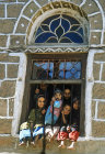 Children in window, Jibla, Yemen