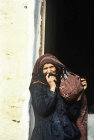Woman in the street, El Abbas, Yemen